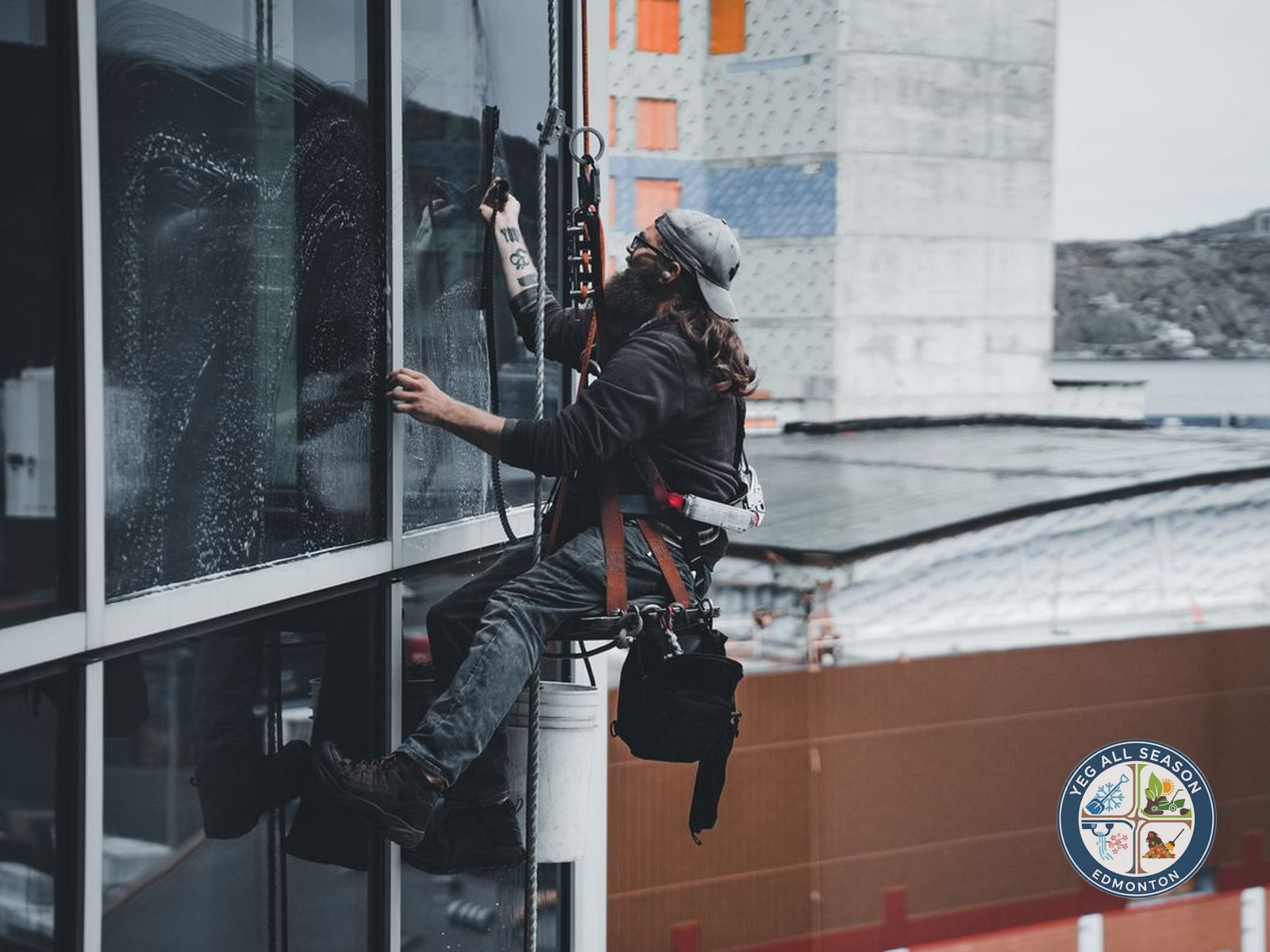 Ladder work on the exterior of a home in the Edmonton area